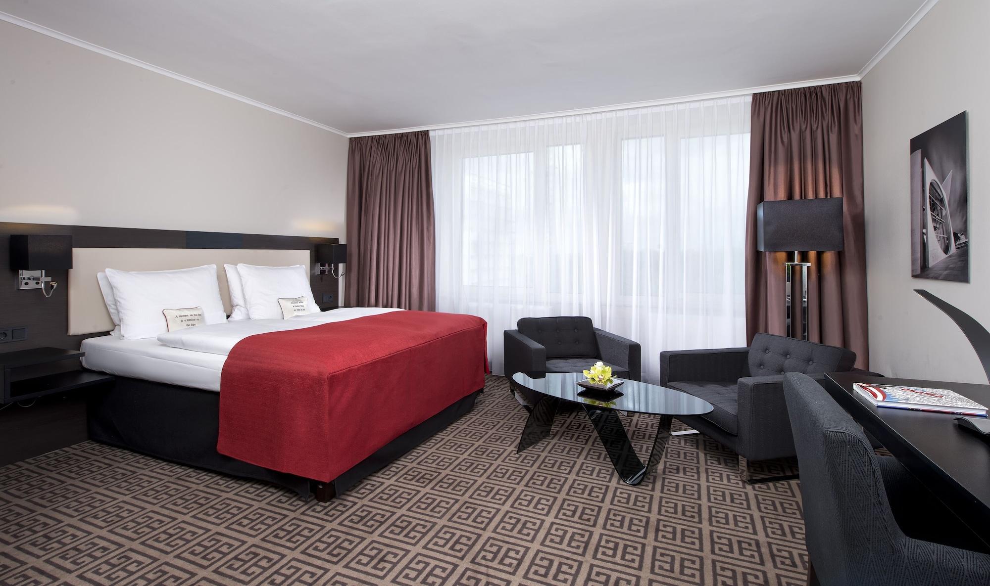 โรงแรมพาเลซ เบอร์ลิน ภายนอก รูปภาพ A room at the hotel